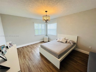 spacious 3-bedroom, 2.5-bath corner unit with 1,760 sq ft in the on Inverrary Country Club in Florida - for sale on GolfHomes.com, golf home, golf lot