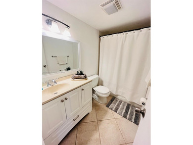 spacious 3-bedroom, 2.5-bath corner unit with 1,760 sq ft in the on Inverrary Country Club in Florida - for sale on GolfHomes.com, golf home, golf lot