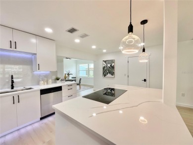 Welcome to your dream home in the heart of Dunedin, one of on The Dunedin Country Club in Florida - for sale on GolfHomes.com, golf home, golf lot
