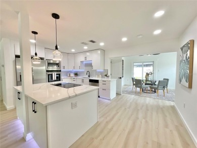 Welcome to your dream home in the heart of Dunedin, one of on The Dunedin Country Club in Florida - for sale on GolfHomes.com, golf home, golf lot