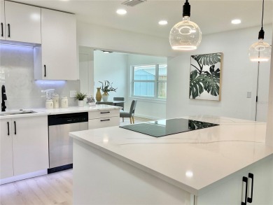 Welcome to your dream home in the heart of Dunedin, one of on The Dunedin Country Club in Florida - for sale on GolfHomes.com, golf home, golf lot