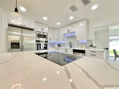 Welcome to your dream home in the heart of Dunedin, one of on The Dunedin Country Club in Florida - for sale on GolfHomes.com, golf home, golf lot
