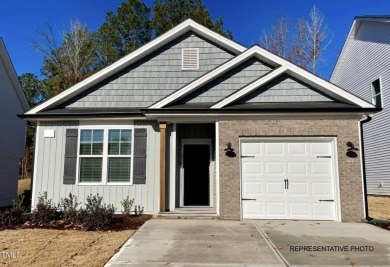 Premium lot! Don't miss this beautiful new ranch home in on Riverwood Golf and Athletic Club in North Carolina - for sale on GolfHomes.com, golf home, golf lot