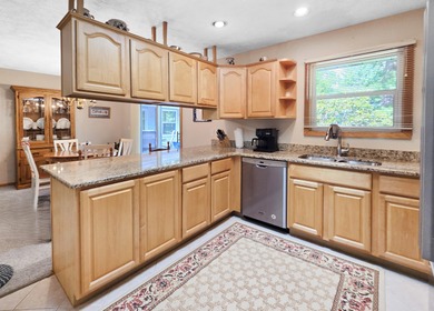 Welcome to this beautiful ranch-style home perfectly positioned on White Deer Country Club in Michigan - for sale on GolfHomes.com, golf home, golf lot