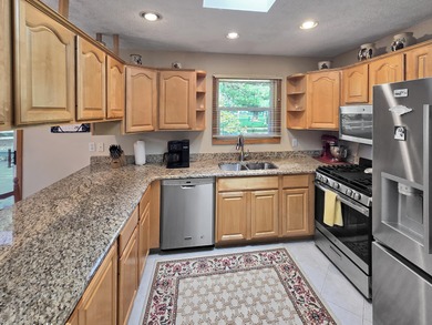 Welcome to this beautiful ranch-style home perfectly positioned on White Deer Country Club in Michigan - for sale on GolfHomes.com, golf home, golf lot