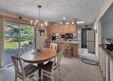 Welcome to this beautiful ranch-style home perfectly positioned on White Deer Country Club in Michigan - for sale on GolfHomes.com, golf home, golf lot