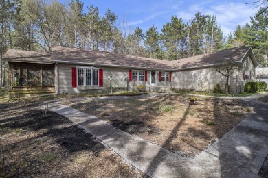 Great location across from the Hemlock Golf Course! This on Hemlock Golf Club in Michigan - for sale on GolfHomes.com, golf home, golf lot