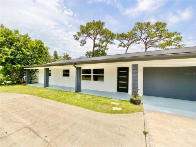 Welcome to your dream home in the heart of Dunedin, one of on The Dunedin Country Club in Florida - for sale on GolfHomes.com, golf home, golf lot