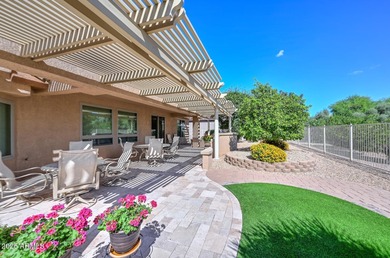 LOCATION, PRIVACY & UPGRADES GALORE! Experience Beauty & Comfort on Sun City Grand Golf Couse and Club in Arizona - for sale on GolfHomes.com, golf home, golf lot