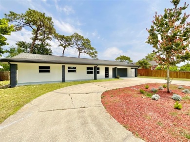Welcome to your dream home in the heart of Dunedin, one of on The Dunedin Country Club in Florida - for sale on GolfHomes.com, golf home, golf lot