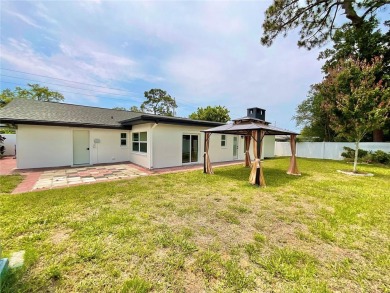 Welcome to your dream home in the heart of Dunedin, one of on The Dunedin Country Club in Florida - for sale on GolfHomes.com, golf home, golf lot