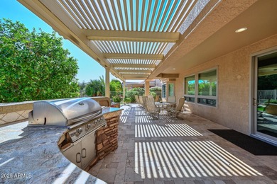 LOCATION, PRIVACY & UPGRADES GALORE! Experience Beauty & Comfort on Sun City Grand Golf Couse and Club in Arizona - for sale on GolfHomes.com, golf home, golf lot