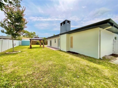Welcome to your dream home in the heart of Dunedin, one of on The Dunedin Country Club in Florida - for sale on GolfHomes.com, golf home, golf lot