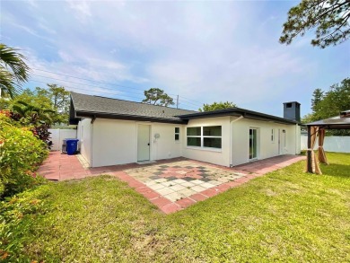 Welcome to your dream home in the heart of Dunedin, one of on The Dunedin Country Club in Florida - for sale on GolfHomes.com, golf home, golf lot