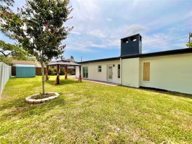Welcome to your dream home in the heart of Dunedin, one of on The Dunedin Country Club in Florida - for sale on GolfHomes.com, golf home, golf lot