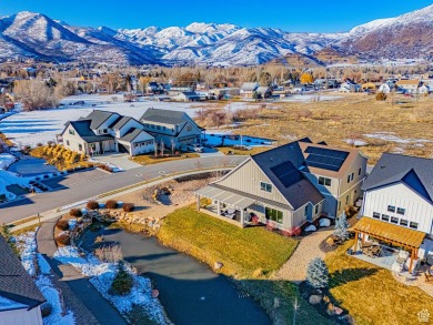 This thoughtfully designed two-story home in the desirable on Homestead Golf Club and Resort in Utah - for sale on GolfHomes.com, golf home, golf lot