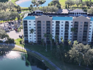 This 1ST FLOOR END UNIT condo with DEEDED COVERED PARKING WITH on Terra Ceia Golf and Country Club in Florida - for sale on GolfHomes.com, golf home, golf lot