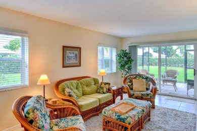 This 1ST FLOOR END UNIT condo with DEEDED COVERED PARKING WITH on Terra Ceia Golf and Country Club in Florida - for sale on GolfHomes.com, golf home, golf lot