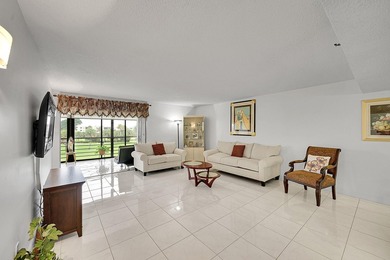 Step into this beautifully updated 55+ condo and immediately on Boca Dunes Golf and Country Club in Florida - for sale on GolfHomes.com, golf home, golf lot