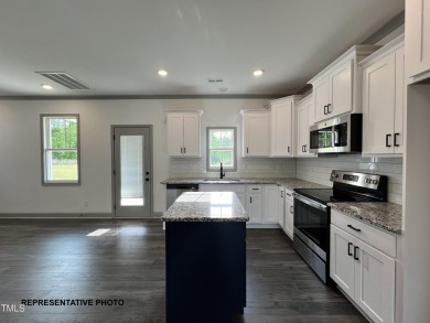 Premium lot! Schedule your tour of this beautiful new home in on Riverwood Golf and Athletic Club in North Carolina - for sale on GolfHomes.com, golf home, golf lot