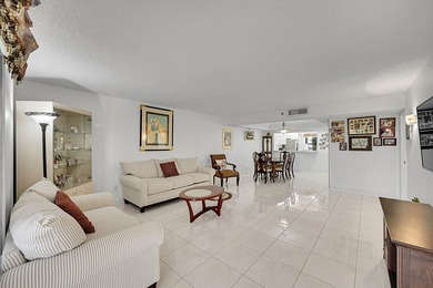 Step into this beautifully updated 55+ condo and immediately on Boca Dunes Golf and Country Club in Florida - for sale on GolfHomes.com, golf home, golf lot
