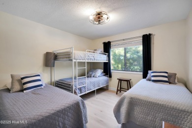 Don't miss this beautifully furnished 3-bedroom, 2-bath condo on Oak Island Golf Club in North Carolina - for sale on GolfHomes.com, golf home, golf lot