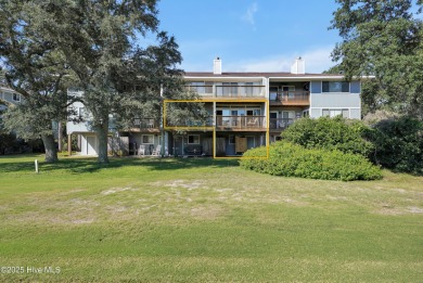 Don't miss this beautifully furnished 3-bedroom, 2-bath condo on Oak Island Golf Club in North Carolina - for sale on GolfHomes.com, golf home, golf lot
