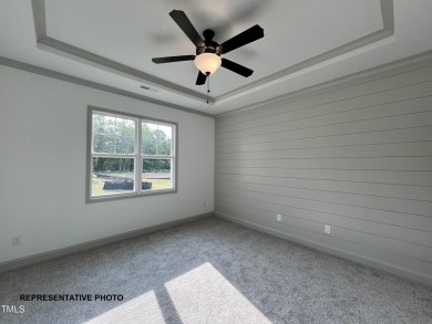 Premium lot! Beautiful new ranch home in Clayton's Ashcroft on Riverwood Golf and Athletic Club in North Carolina - for sale on GolfHomes.com, golf home, golf lot