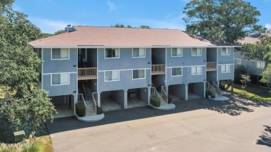 Don't miss this beautifully furnished 3-bedroom, 2-bath condo on Oak Island Golf Club in North Carolina - for sale on GolfHomes.com, golf home, golf lot