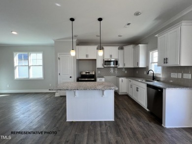 Premium lot! This gorgeous new construction home highlights on Riverwood Golf and Athletic Club in North Carolina - for sale on GolfHomes.com, golf home, golf lot
