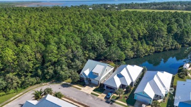 Gold Fortified home in the highly sought after Cypress Village on Orange Beach Golf Center in Alabama - for sale on GolfHomes.com, golf home, golf lot