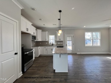 Premium lot! This gorgeous new construction home highlights on Riverwood Golf and Athletic Club in North Carolina - for sale on GolfHomes.com, golf home, golf lot
