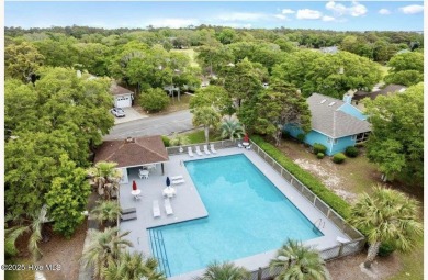 Don't miss this beautifully furnished 3-bedroom, 2-bath condo on Oak Island Golf Club in North Carolina - for sale on GolfHomes.com, golf home, golf lot