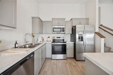 Welcome home to this stunning townhome built by local builder on Territory Golf Club in Minnesota - for sale on GolfHomes.com, golf home, golf lot