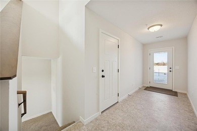 Welcome home to this stunning townhome built by local builder on Territory Golf Club in Minnesota - for sale on GolfHomes.com, golf home, golf lot