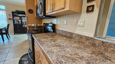 PRICE REDUCED! This captivating home located in the Premier 55+ on The Riverside Golf Club in Florida - for sale on GolfHomes.com, golf home, golf lot