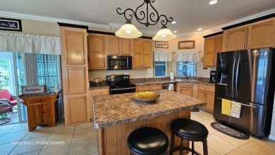 PRICE REDUCED! This captivating home located in the Premier 55+ on The Riverside Golf Club in Florida - for sale on GolfHomes.com, golf home, golf lot