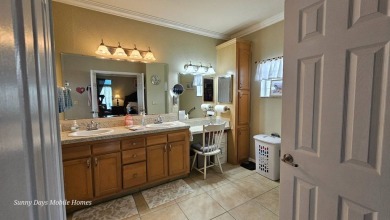 PRICE REDUCED! This captivating home located in the Premier 55+ on The Riverside Golf Club in Florida - for sale on GolfHomes.com, golf home, golf lot