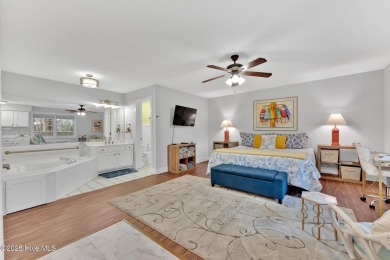 Top-Floor Investment Opportunity - Fully Furnished Condo Just on Oyster Bay Golf Links in North Carolina - for sale on GolfHomes.com, golf home, golf lot