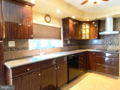 Nestled under mature shade trees in Willingboro's Country Club on Rancocas Golf Club in New Jersey - for sale on GolfHomes.com, golf home, golf lot