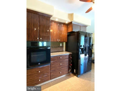 Nestled under mature shade trees in Willingboro's Country Club on Rancocas Golf Club in New Jersey - for sale on GolfHomes.com, golf home, golf lot