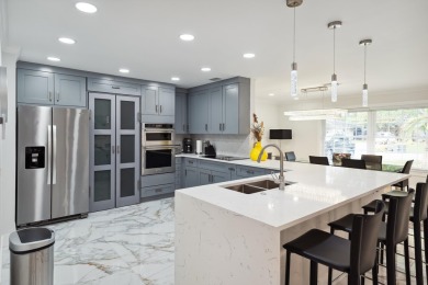 Spectacular fully renovated& fully furnished single-family home on BallenIsles Golf and Country Club in Florida - for sale on GolfHomes.com, golf home, golf lot