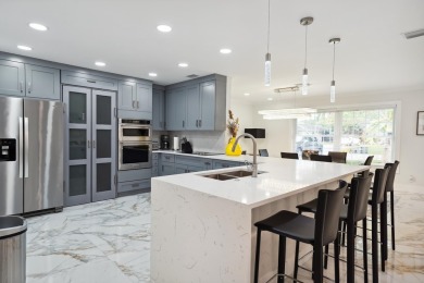 Spectacular fully renovated& fully furnished single-family home on BallenIsles Golf and Country Club in Florida - for sale on GolfHomes.com, golf home, golf lot