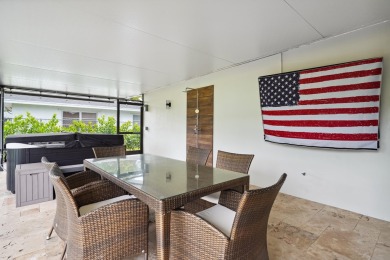 Spectacular fully renovated& fully furnished single-family home on BallenIsles Golf and Country Club in Florida - for sale on GolfHomes.com, golf home, golf lot