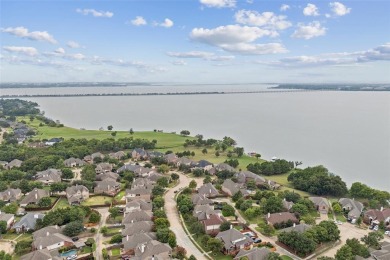 Discover the charm of The Shores community in Rockwall, just on The Shores Country Club in Texas - for sale on GolfHomes.com, golf home, golf lot