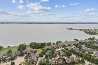 Discover the charm of The Shores community in Rockwall, just on The Shores Country Club in Texas - for sale on GolfHomes.com, golf home, golf lot