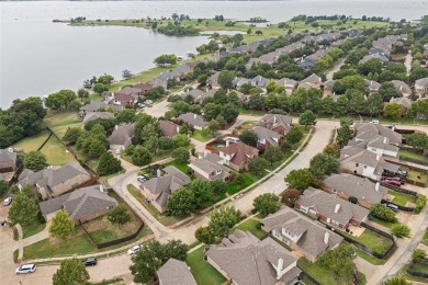 Discover the charm of The Shores community in Rockwall, just on The Shores Country Club in Texas - for sale on GolfHomes.com, golf home, golf lot