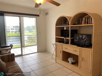 MUST SEE! Very well maintained turn key furnished 2 bedroom 1.5 on Hillsboro Pines Golf in Florida - for sale on GolfHomes.com, golf home, golf lot