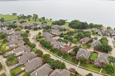 Discover the charm of The Shores community in Rockwall, just on The Shores Country Club in Texas - for sale on GolfHomes.com, golf home, golf lot