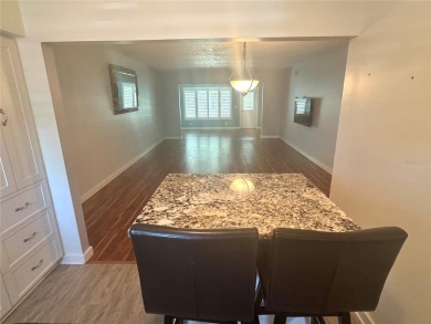 HIGHLY SOUGHT AFTER UPDATED GROUND FLOOR 1415SF CONDO. HIGH-END on On Top Of The World Golf Course in Florida - for sale on GolfHomes.com, golf home, golf lot